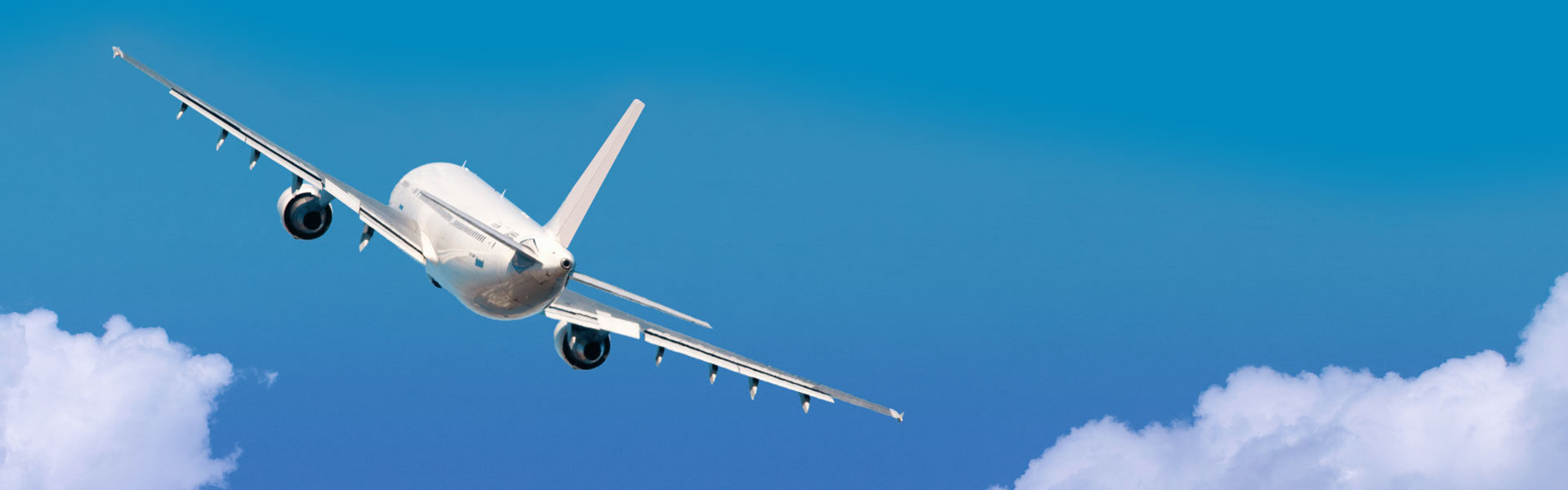 Airplane in the sky with clouds